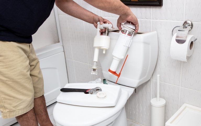 https://hydrosolutions.akmarketing.com.au/wp-content/uploads/2026/05/man-using-tools-repairing-reservoir-in-a-bathroom-768x482-1.jpg